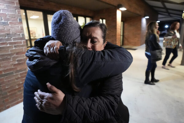 UVALDE — Aftermath of school shootings don’t go away: Dora Mendoza, right, is hugged by a friend as she leaves a meeting where Attorney General Merrick Garland shared a report on the findings of an investigation into the 2022 school shooting at Robb Elementary School, Wednesday, Jan. 17, 2024, in Uvalde, Texas. Mendoza is the grandmother of 10-year-old Amerie Jo Garza, who was killed in the shooting.Photo: Eric Gay/AP