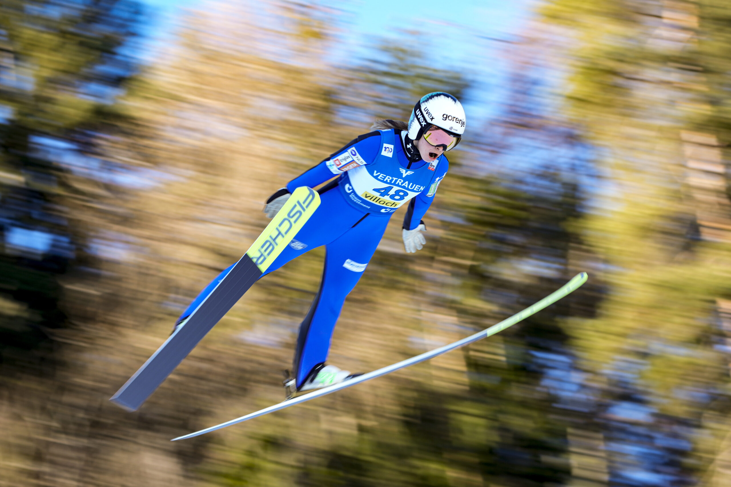 AUSTRIA — Flying with skis for wings: Slovenia's Nika Kriznar competes at the Women Normal Hill Individual Ski Jumping World Cup event in Villach, Austria, Thursday, Jan. 4, 2024.Photo: Darko Bandic/AP