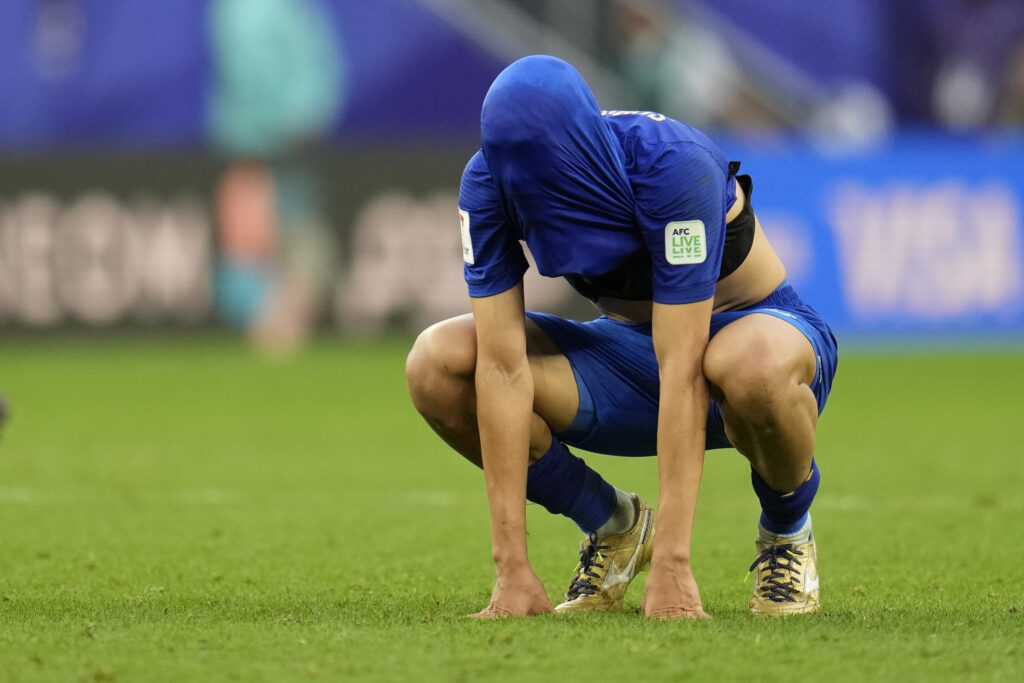 QATAR — When it’s hard to face the facts: Thailand's Supachai Chaided is dejected at full time of the Asian Cup round of 16 soccer match between Uzbekistan and Thailand at Al Janoub Stadium in Al Wakrah, Qatar, Tuesday, Jan. 30, 2024. Uzbekistan won 2-1.Photo: Aijaz Rahi/AP