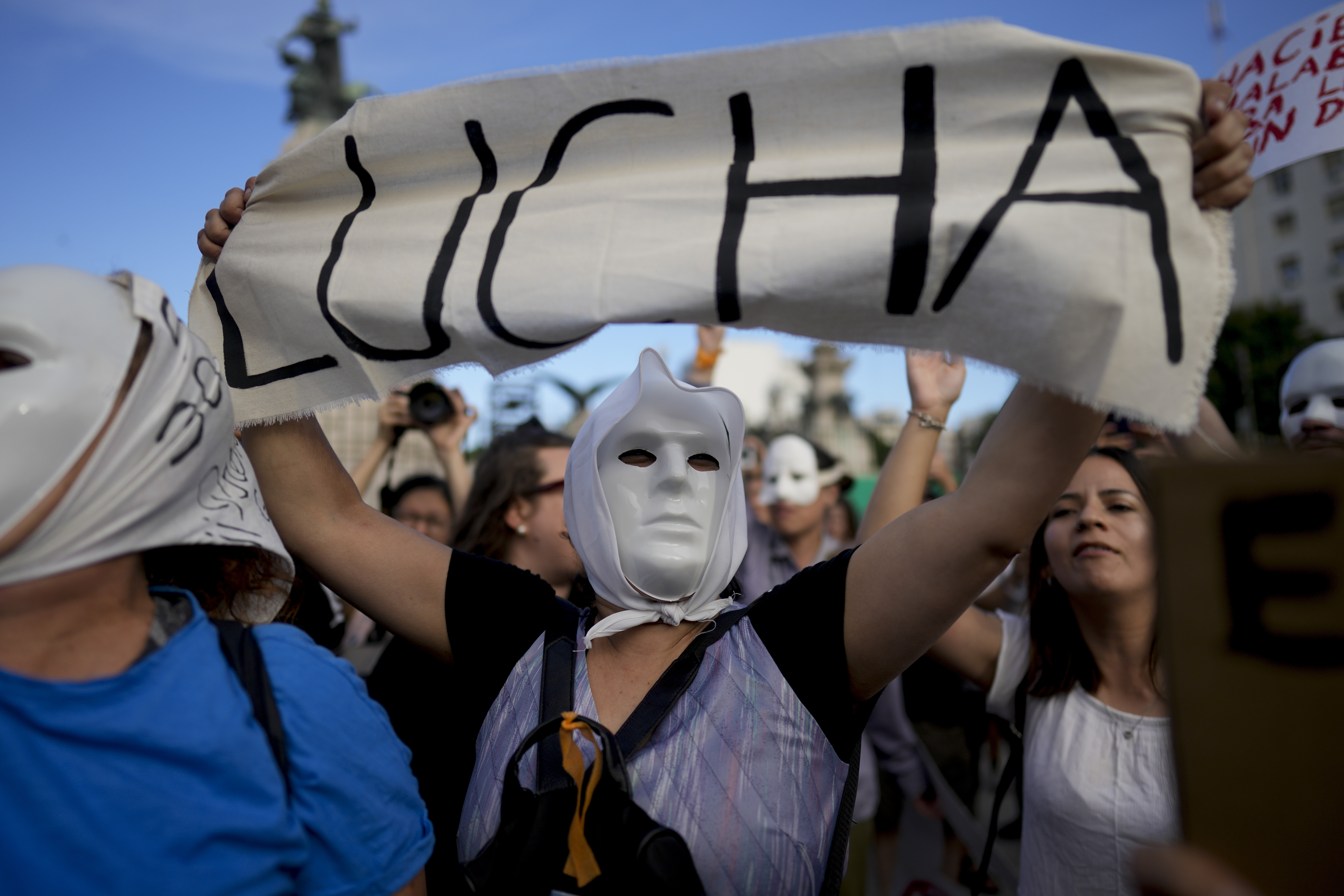 BUENOS AIRES — Simply put, ‘FIGHT’: A woman wearing a mask holds a banner emblazoned with the Spanish word for fight, during a protest against measures regarding the cultural policies of President Javier Milei's government, in Buenos Aires, Argentina, Thursday, Jan. 4, 2024.Photo: Natacha Pisarenko/AP