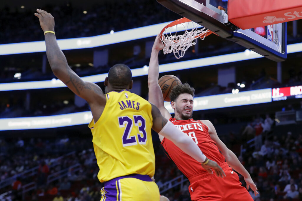 HOUSTON — ‘Did I just pull a dunk on LeBron?’: Houston Rockets center Alperen Sengun, right, dunks in front of Los Angeles Lakers forward LeBron James (23) during the second half of an NBA basketball game Monday, Jan. 29, 2024, in Houston.Photo: Michael Wyke/AP