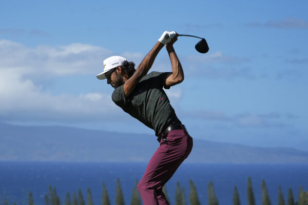 <b>HAWAII — Lithe bodies turn better:</b> Akshay Bhatia hits from the 18th tee during the third round of The Sentry golf event, Saturday, Jan. 6, 2024, at Kapalua Plantation Course in Kapalua, Hawaii.<br>Photo: Matt York/AP