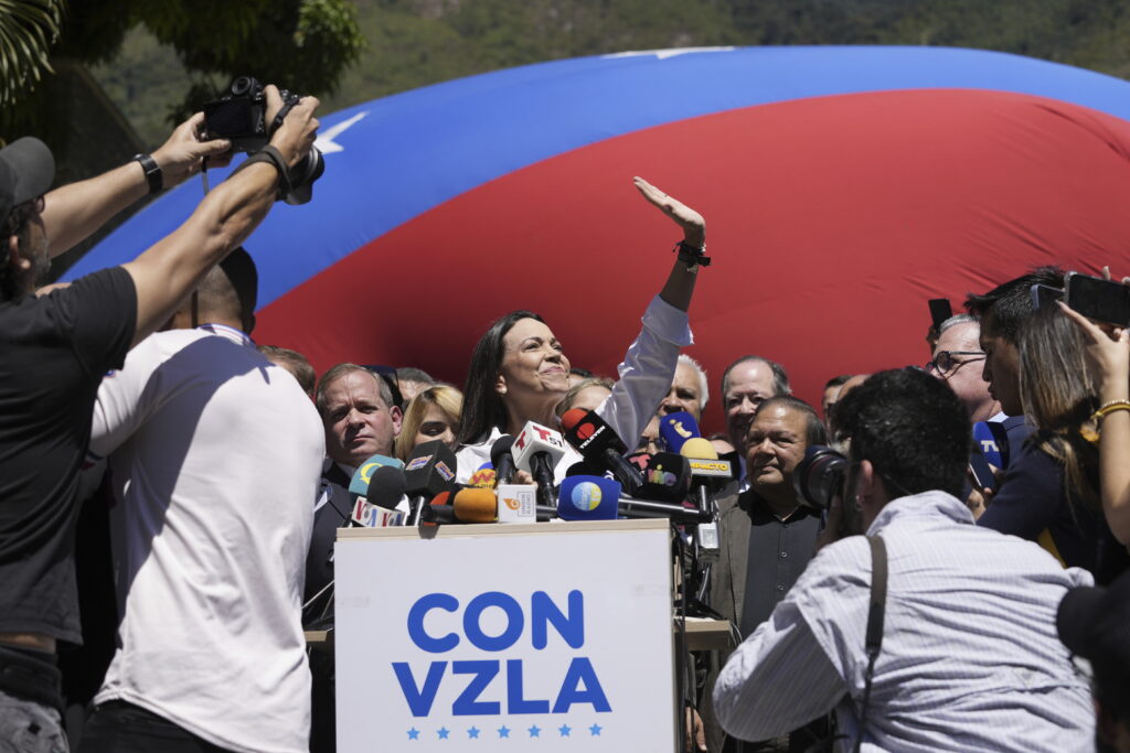 VENEZUELA — Not even the highest court will keep her from racing: Opposition coalition presidential hopeful Maria Corina Machado gives a press conference outside her campaign headquarters in Caracas, Venezuela, Monday, Jan. 29, 2024, days after the country's highest court upheld a ban on her presidential candidacy.Photo: Ariana Cubillos/AP
