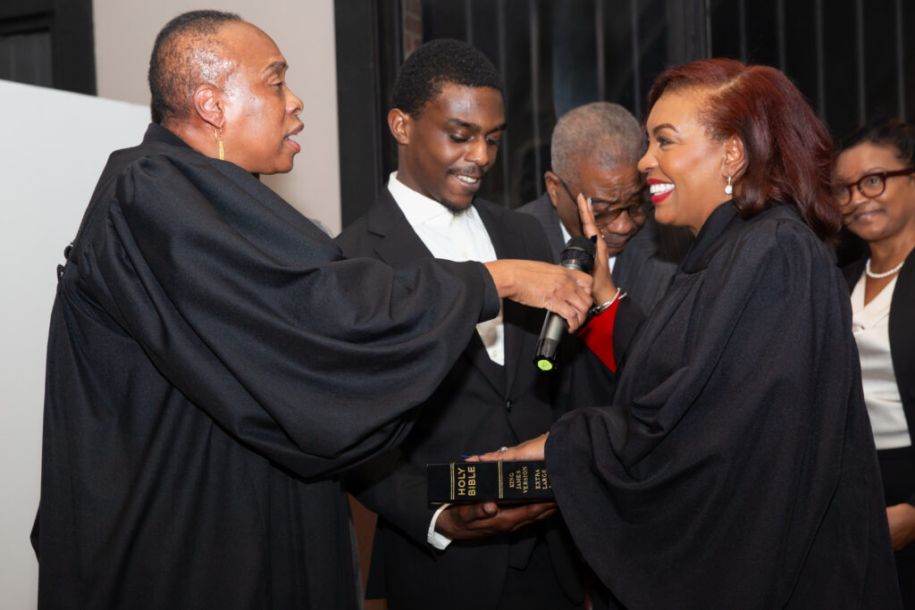 Justice Sharon Bourne-Clarke taking the oath of office, administered by Hon. Wavny Toussaint, during her induction ceremony into the New York Supreme Court.Photos: Solwazi Afi Olusola courtesy of Justice Borne-Clarke