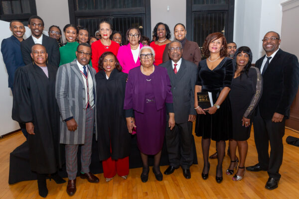 In a celebratory gathering after the formalities, Justice Bourne-Clarke is seen amidst a close-knit circle of family, friends and longtime supporters.