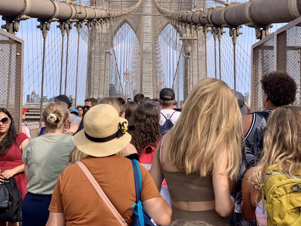 The crowds on the Brooklyn Bridge pedestrian walkway have been steadily increasing since the bike lane was removed during the de Blasio administration. This photo shows the walkway during the summer of 2023.Photos: Mary Frost, Brooklyn Eagle
