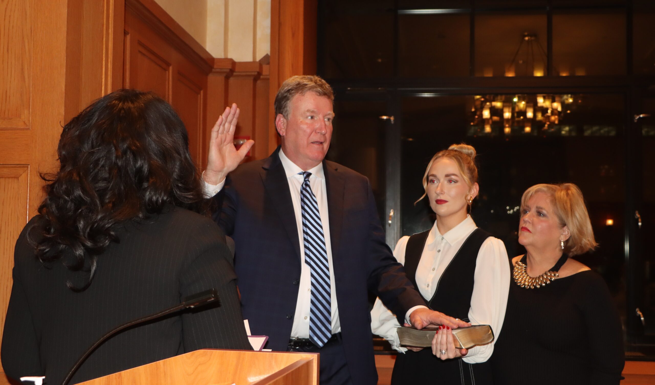 Hon. Bernard Graham has his family at his side as he is officially sworn in as the elected Surrogate Court justice in Kings County by the NYC Corporation Counsel Sylvia Hinds-Radix (left).Photos: Mario Belluomo/AP