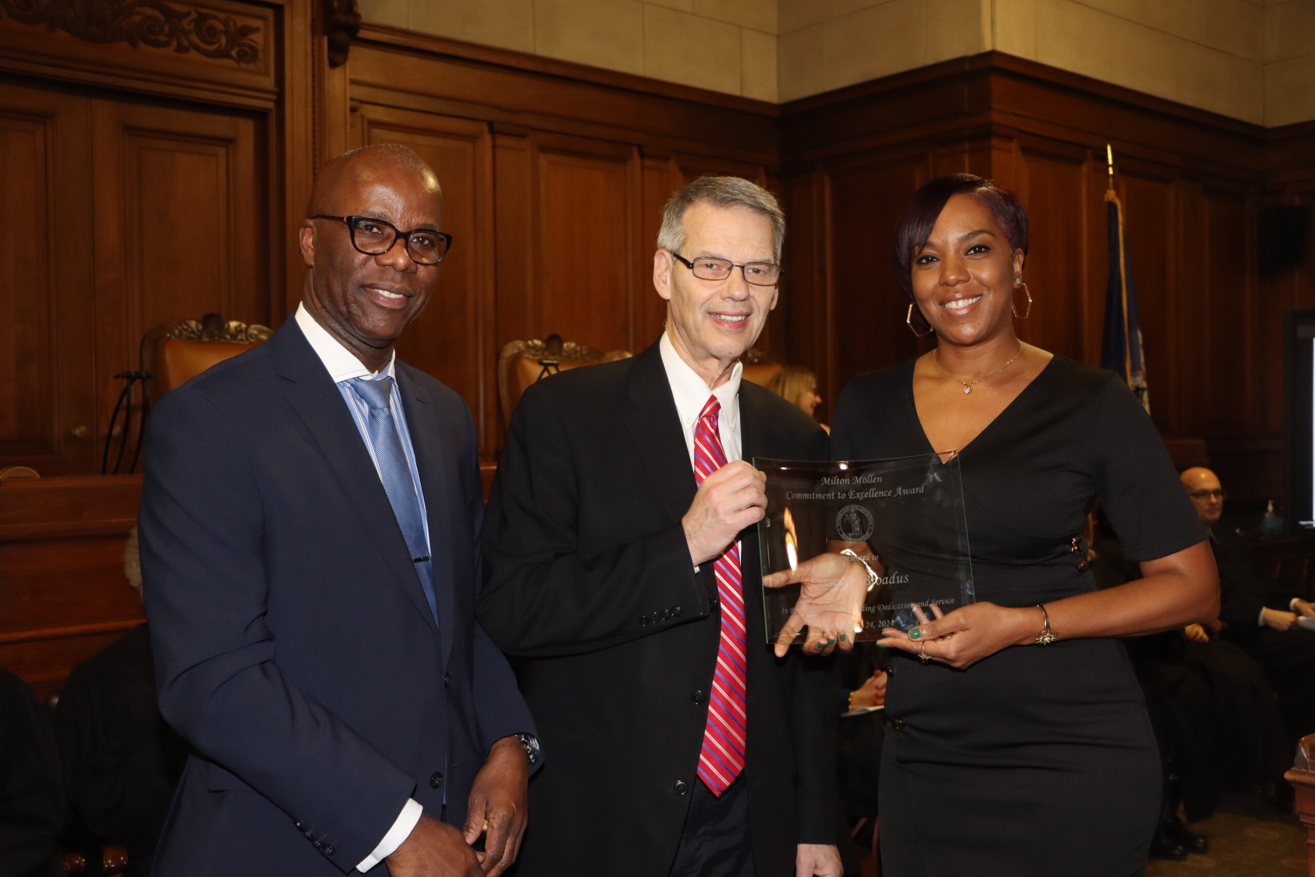 Tamara Broadus, a court clerk specialist from the Kings County Supreme Court, Civil Term, was presented with the Mollen Award by Chief Clerk Charles Small (left) and Administrative Judge Lawrence Knipel (center).Photos: Mario Belluomo/Brooklyn Eagle