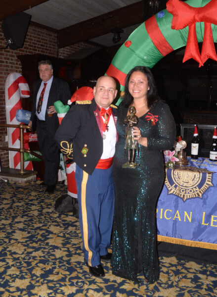 From left: Major Juan Diaz and Legionnaire Marisol Mateo, recipient of the Joan of Arc award at American Legion awards ceremony.