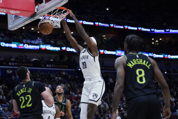 Day'Ron Sharpe slams home two of his 12 points during the Nets' fourth straight loss to the Pelicans Wednesday.<br>Photo: Gerald Herbert/AP