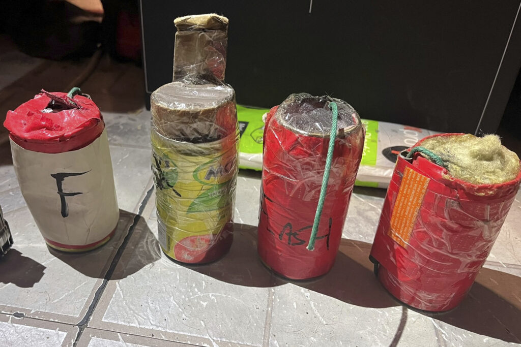 This photo provided by the Queens County, N.Y., District Attorney's Office shows improvised explosive devices found at the apartment of two brothers in Astoria, where they live with their mother and another brother.Photos courtesy of Queens County District Attorney's Office via AP