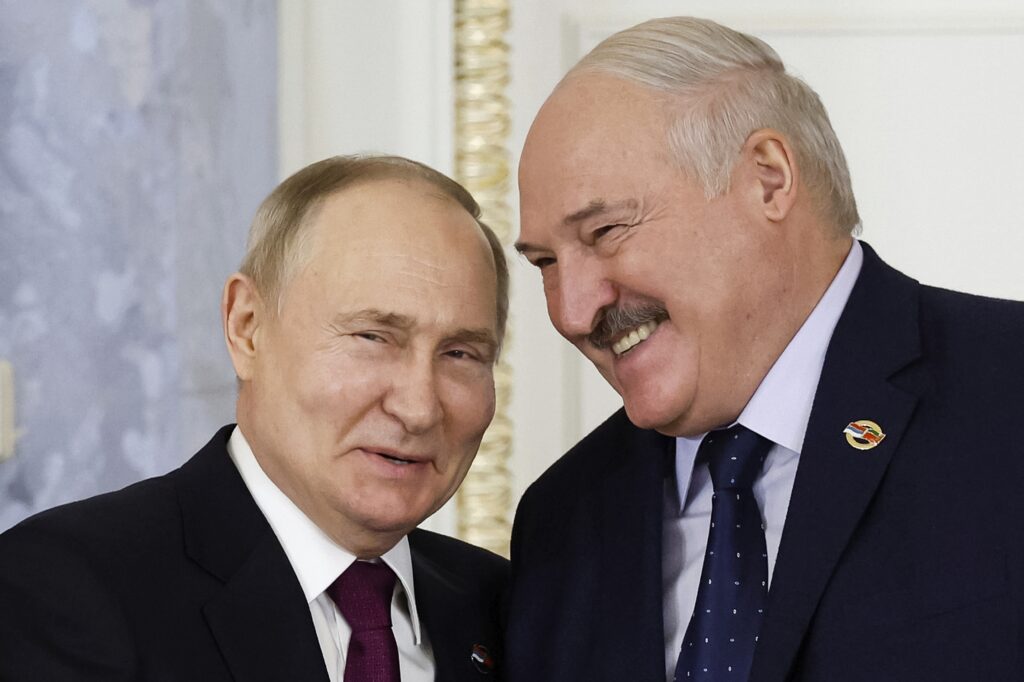 ST. PETERSBURG — Allies in the reunification of former Soviet Republics: Russian President Vladimir Putin, left, and Belarus President Alexander Lukashenko shake hands during a meeting of the Union State Supreme Council in St. Petersburg, Russia, Monday, Jan. 29, 2024.Photo: Dmitry Astakhov, Sputnik, Government Pool Photo via AP