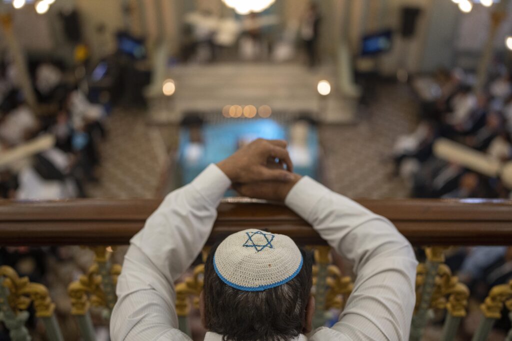 MUMBAI — Remembering the Holocaust all around the world: A delegate observes a moment of silence during a ceremony to mark International Holocaust Remembrance Day at the Keneseth Eliyahoo Synagogue in Mumbai, India, Monday, Jan. 29, 2024.Photo: Rafiq Maqbool/AP