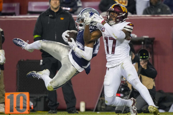 <b>MARYLAND — ‘Hey, that ball is meant for me’:</b> Dallas Cowboys cornerback DaRon Bland (26) making an interception catch against Washington Commanders wide receiver Terry McLaurin (17) during the second half of an NFL football game, Sunday, Jan. 7, 2024, in Landover, MD.<br>Photo: Susan Walsh/AP