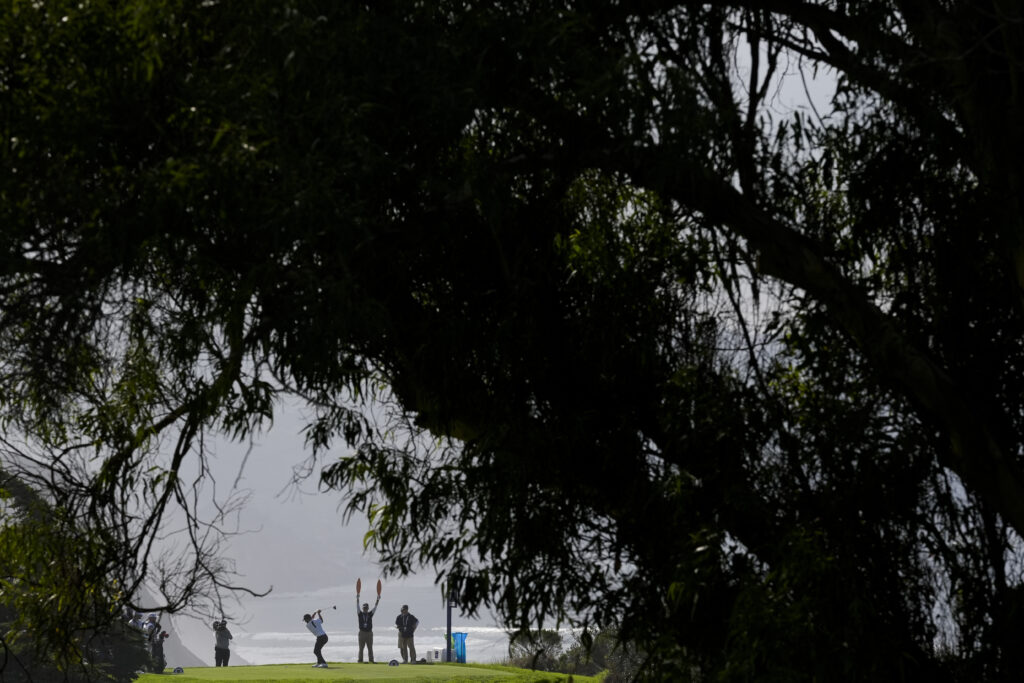 SAN DIEGO — A dramatic beginning on a battlefield where the beautiful trees are the hazards: Xander Schauffele hits his tee shot on the 16th hole of the North Course at Torrey Pines during the second round of the Farmers Insurance Open golf tournament, Thursday, Jan. 25, 2024, in San Diego.Photo: Gregory Bull/AP