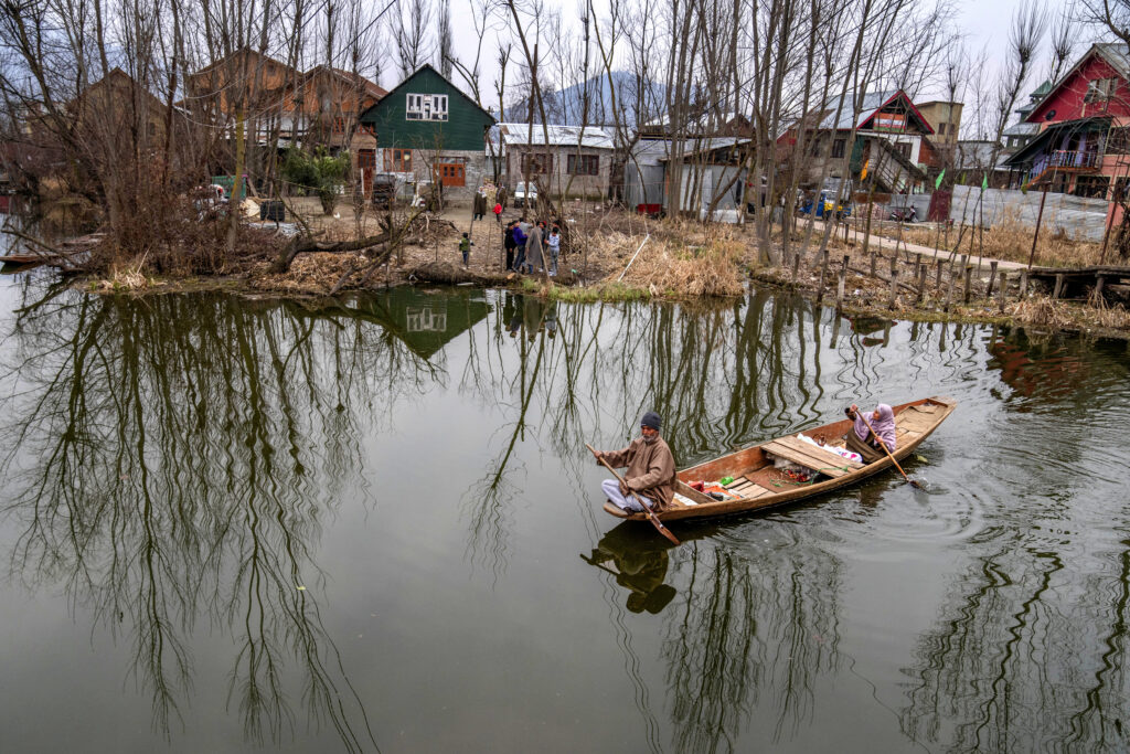 KASHMIR — Everyone’s commute looks a little different: A couple on their way home after the day's work row a shikara, or traditional boat, in the interiors of the Dal Lake in Srinagar, Indian-controlled Kashmir, Thursday, Feb. 29, 2024.Photo: Dar Yasin/AP