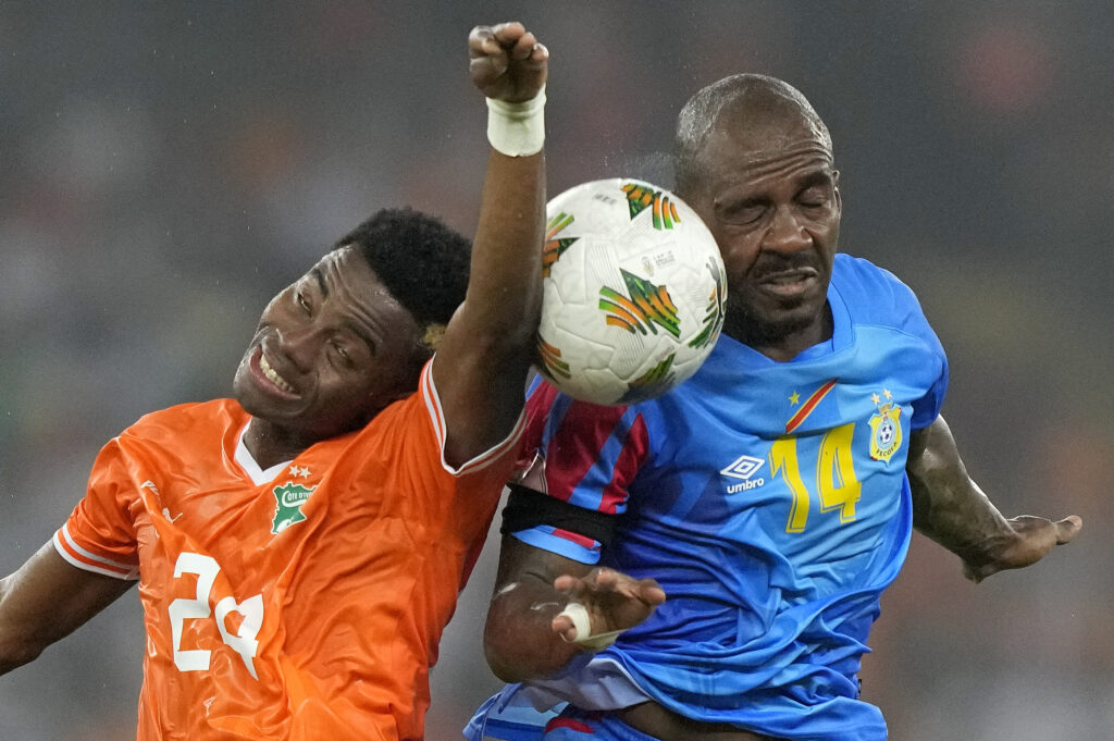 IVORY COAST — Battling for the vital orb, but don’t touch: DR Congo's Gael Kakuta, right, battles for the ball with Ivory Coast's Simon Adingra during the African Cup of Nations semifinal soccer match between Ivory Coast and DR Congo at the Olympic Stadium of Ebimpe in Abidjan, Ivory Coast, Wednesday, Feb. 7, 2024.Photo: Sunday Alamba/AP