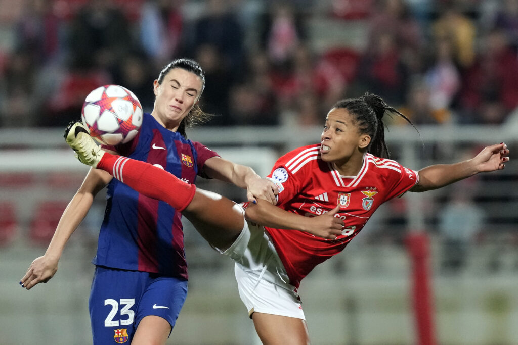 LISBON — The no-hands rule means you might end up with some cleats in your face: Benfica's Jessica Silva, right, fights for the ball with Barcelona's Ingrid Syrstad Engen during the women's Champions League group A soccer match between SL Benfica and FC Barcelona at the Benfica Campus in Seixal, outside Lisbon, Wednesday, Jan. 31, 2024.Photo: Armando Franca/AP