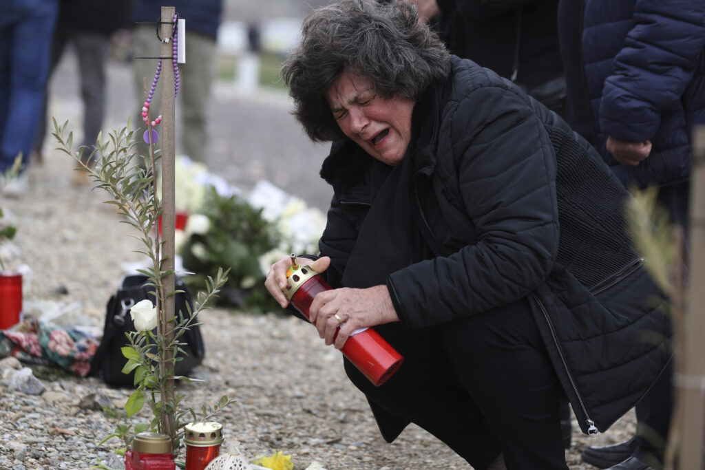 ATHENS — Painful memories of a deadly rail tragedy: A relative of a victim mourns as she lights a candle during a memorial service of the first anniversary of the country's deadliest rail crash, which killed 57 people, in Tempe, about 376 kilometers (235 miles) north of Athens, near Larissa city, Greece, Wednesday, Feb. 28, 2024. The train disaster on the night of Feb. 28, 2023, shocked the country. Many of the victims were university students heading back to class after a public holiday when their passenger train slammed into an oncoming cargo train after the two were accidentally put onto the same track heading in opposite directions.Photo: Vaggelis Kousioras/AP