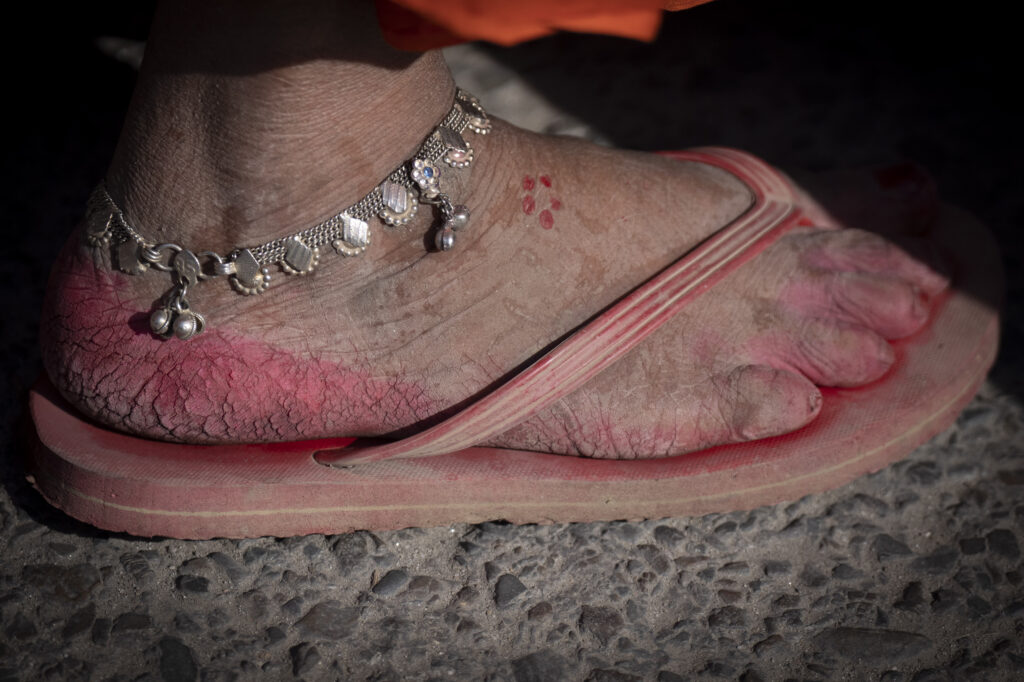 KATHMANDU — The message is, ‘We’re in the red’: The foot of a protestor is seen as borrowers, mostly farmers from Nepal’s rural districts, protesting against the alleged excesses of private lenders gathered in Kathmandu, Nepal, on Friday, Feb. 23, 2024. Hundreds of protestors from remote villages had walked for weeks to arrive in the capital to demand that the government enact laws to regulate the lenders.Photo: Niranjan Shrestha/AP