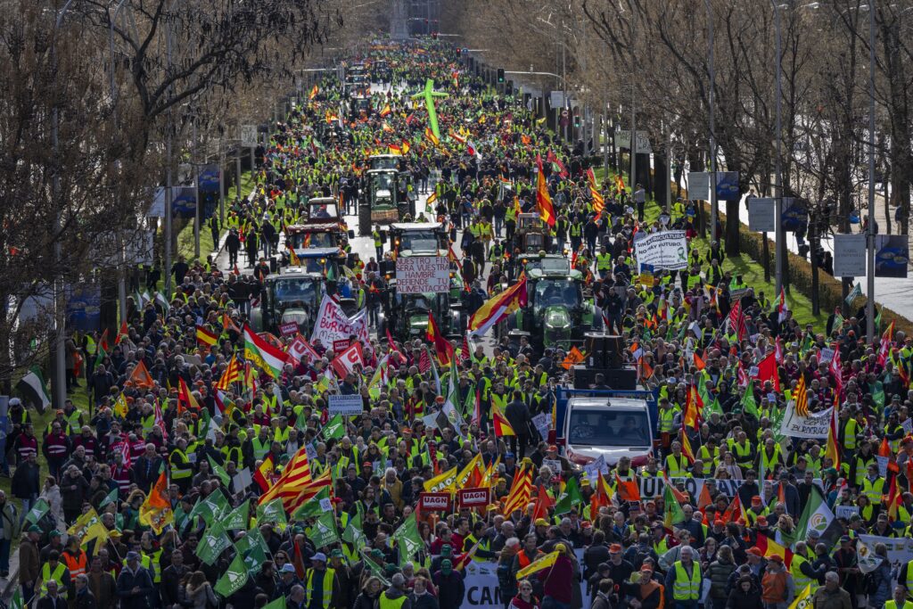 MADRID — Unhappy farmers here, and all over Europe, are not surviving the fixed prices in environmental restrictions: Farmers rally towards the European Parliament offices in Madrid, Spain, Monday, Feb. 26, 2024.Photo: Bernat Armangue/AP