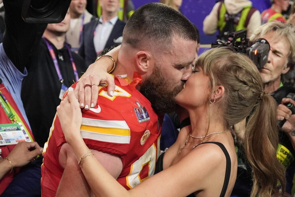 LAS VEGAS — ‘Hey, we’re in Las Vegas… will you marry me? — No, not until you have more Superbowl rings’: Kansas City Chiefs tight end Travis Kelce (87) kisses Taylor Swift after the NFL Super Bowl 58 football game against the San Francisco 49ers, Sunday, Feb. 11, 2024, in Las Vegas. The Chiefs won 25-22.Photo: John Locher/AP