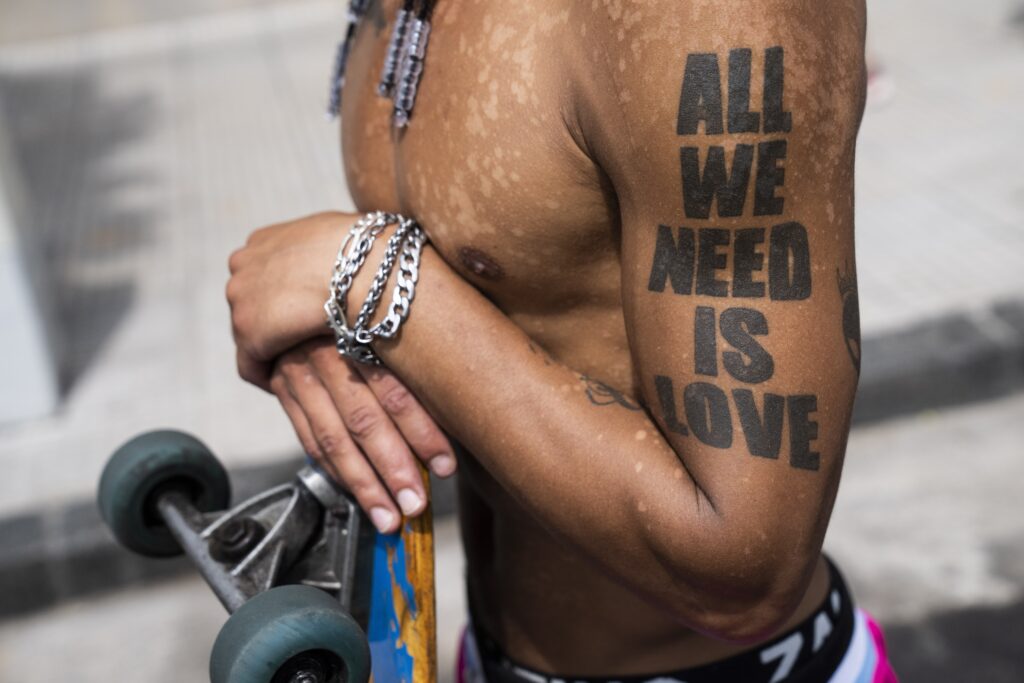 BUENOS AIRES — All we need is love, but budgeting for soup kitchens would be nice too: Skater Christoper Melgar watches security forces during a protest against food scarcity affecting community soup kitchens in Buenos Aires, Argentina, Thursday, Feb. 8, 2024.Photo: Rodrigo Abd/AP