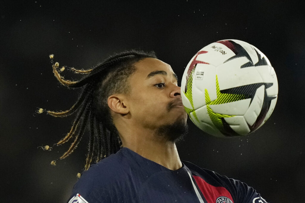 PARIS — One way to keep an eye on the ball: PSG's Bradley Barcola controls the ball during the French League One soccer match between Paris Saint-Germain and Lille at the Parc des Princes stadium in Paris, France, Saturday, Feb. 10, 2024.Photo: Thibault Camus/AP