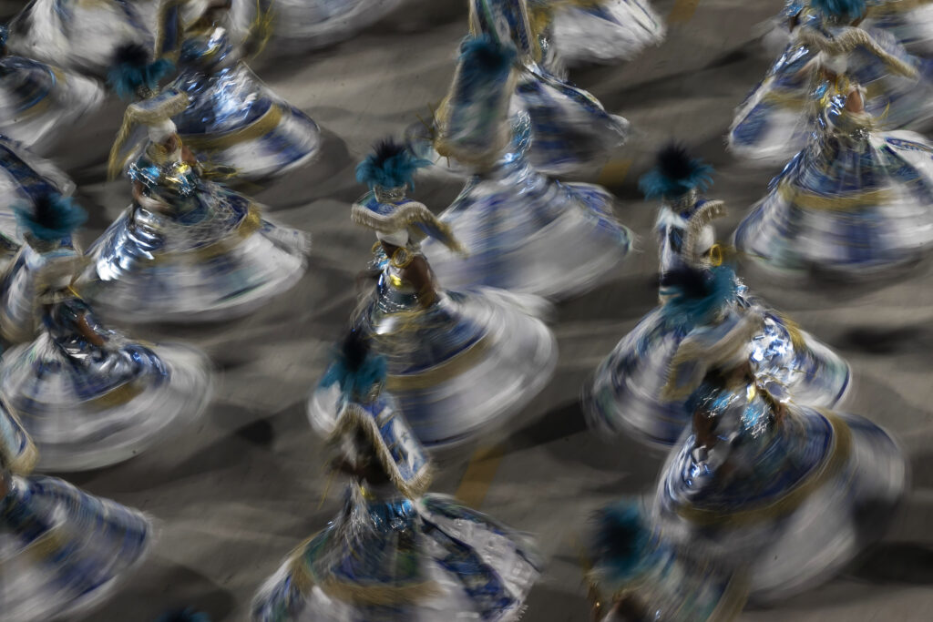 RIO DE JANEIRO — Dervishes whirl as a form of meditation, Brazilians do it as a form of celebration: Performers from the Portela samba school parade during Carnival celebrations at the Sambadrome in Rio de Janeiro, Brazil, early Tuesday, Feb. 13, 2024.Photo: Bruna Prado/AP