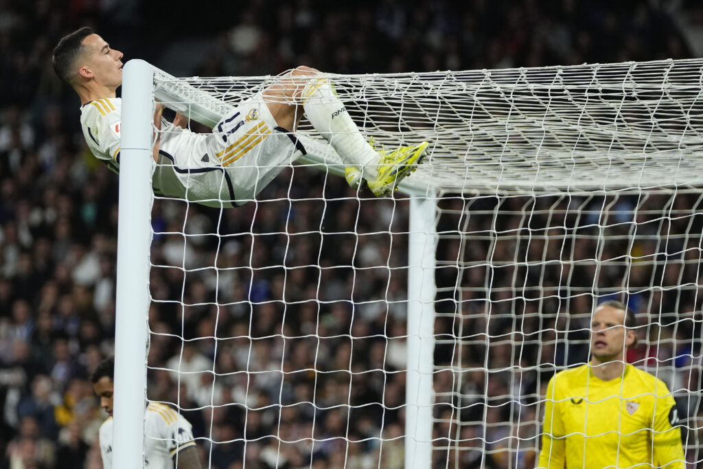 MADRID — ‘Hold on, fella, only one ball goes into the goal net’: Real Madrid's Lucas Vazquez hangs from the crossbar during a Spanish La Liga soccer match between Real Madrid and Sevilla at the Santiago Bernabeu stadium in Madrid, Spain, Sunday, Feb. 25, 2024.Photo: Manu Fernandez/AP