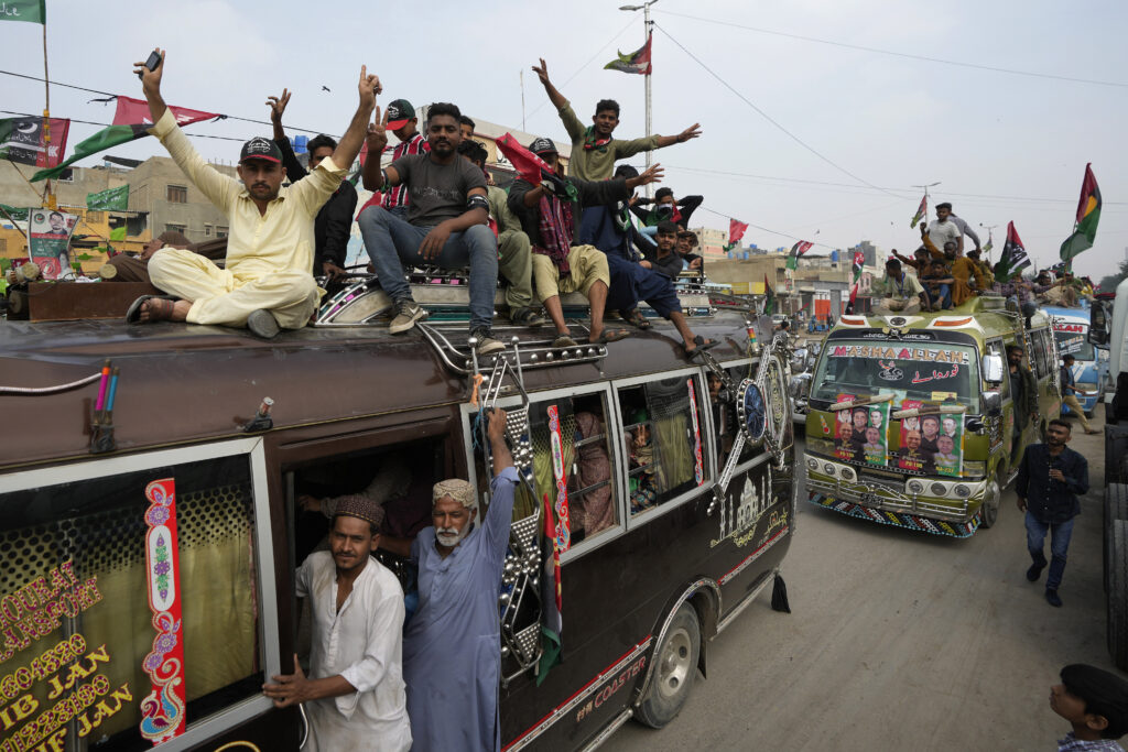 KARACHI — Pakistani people power on the move: Supporters of Pakistan People's Party travel on vehicles and flashing victory signs during an election campaign rally in Karachi, Pakistan, Monday, Feb. 5, 2024.Photo: Fareed Khan/AP