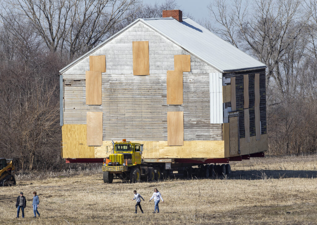 IOWA — Historic preservation, midwest style: The Stagecoach Inn building is transported along corn fields to avoid power lines in West Liberty, Iowa on Sunday, Feb. 25, 2024. The building was moved about three miles by the West Liberty Heritage Foundation to Heritage Park.Photo: Savannah Blake/The Gazette via AP