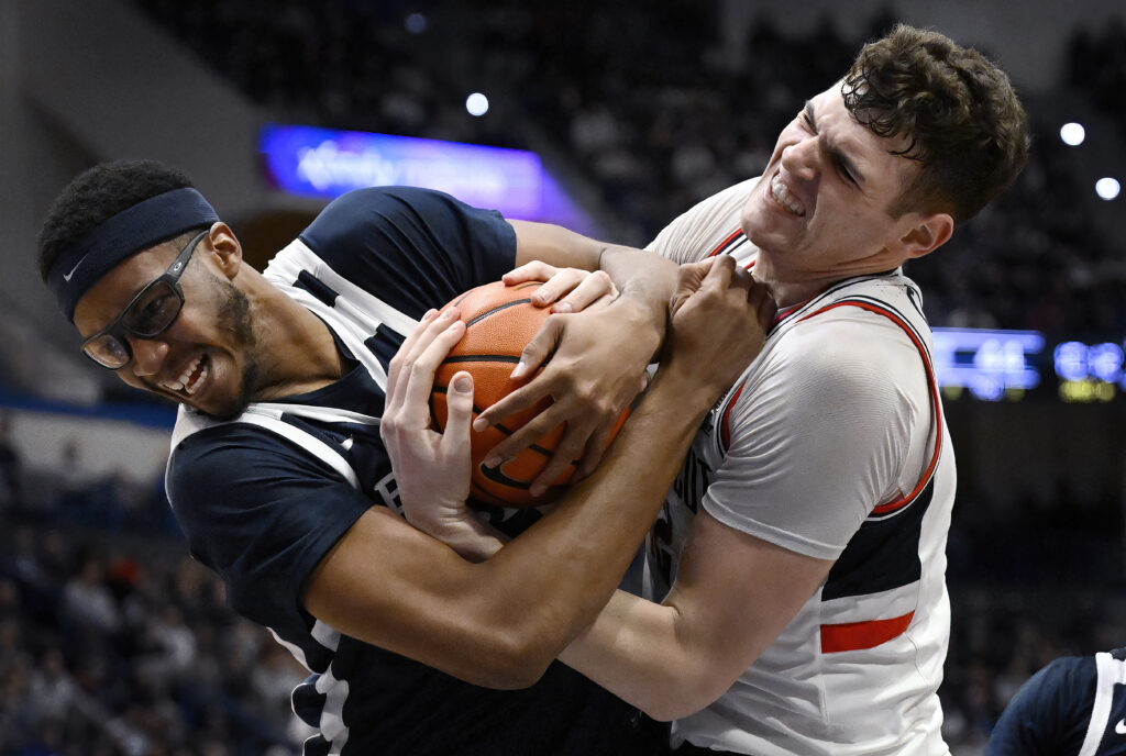 HARTFORD — Clingan clinging to the ball: Butler center Andre Screen, left, and UConn center Donovan Clingan wrestle for the ball in the second half of an NCAA college basketball game, Tuesday, Feb. 6, 2024, in Hartford, Conn.Photo: Jessica Hill/AP