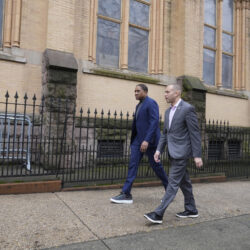 House Minority Leader Hakeem Jeffries, D-N.Y., right, talks with Rev, Lawrence E. Aker, III, as they walk around Cornerstone Baptist Church in Brooklyn.