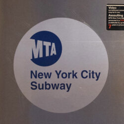 The MTA logo is seen on the side of a New York City subway car.