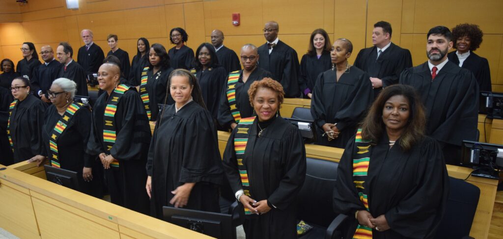 Brooklyn's judiciary representing each of the courts attend in observance of the ceremonies proceedings.