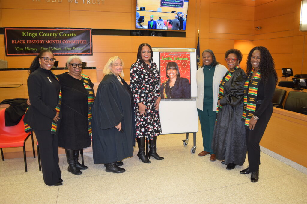 Pictured from left to right: Hon. Lola Waterman, Hon. Lisa Ottley, Hon. Deborah Dowling, Meredith Suttles, a photo of the late Izetta Johnson, Deputy Borough President Reverend Kimberly Council, Hon. Robin Sheares and Leah Richardson.