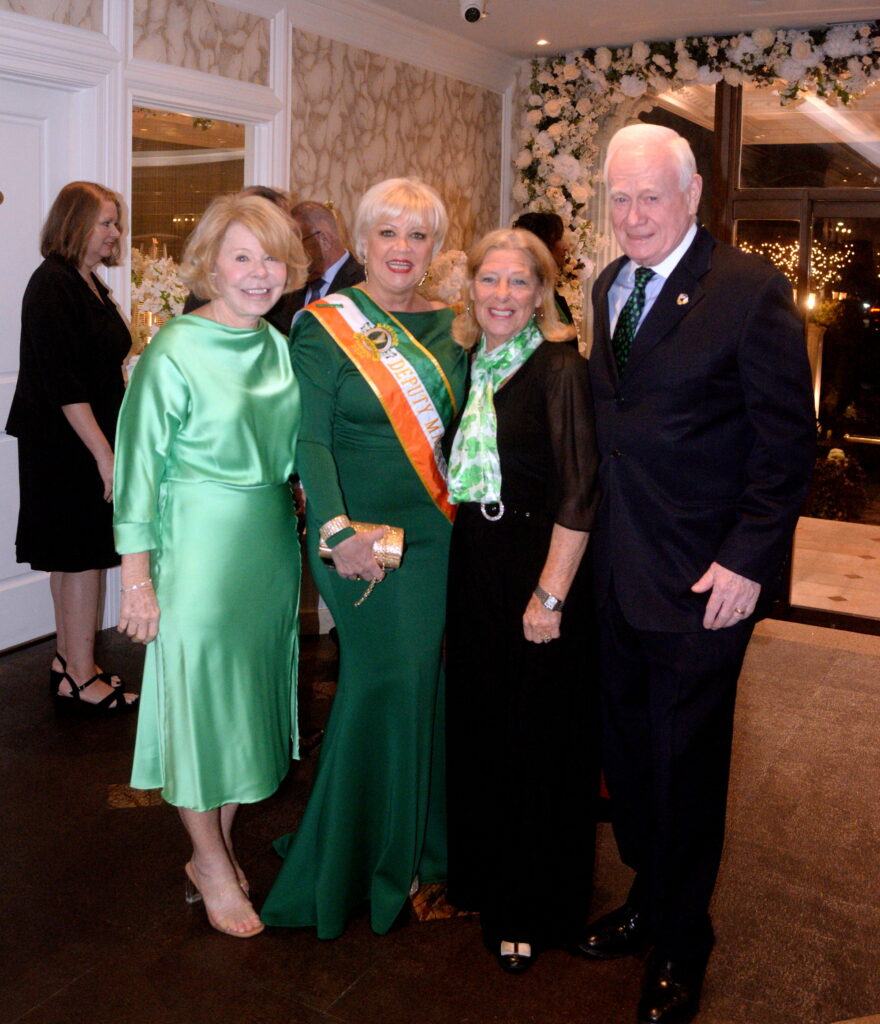 Former State Sen. Marty Golden beside a parade deputy marshal and guests at Bay Ridge St. Patrick's Day Gala.