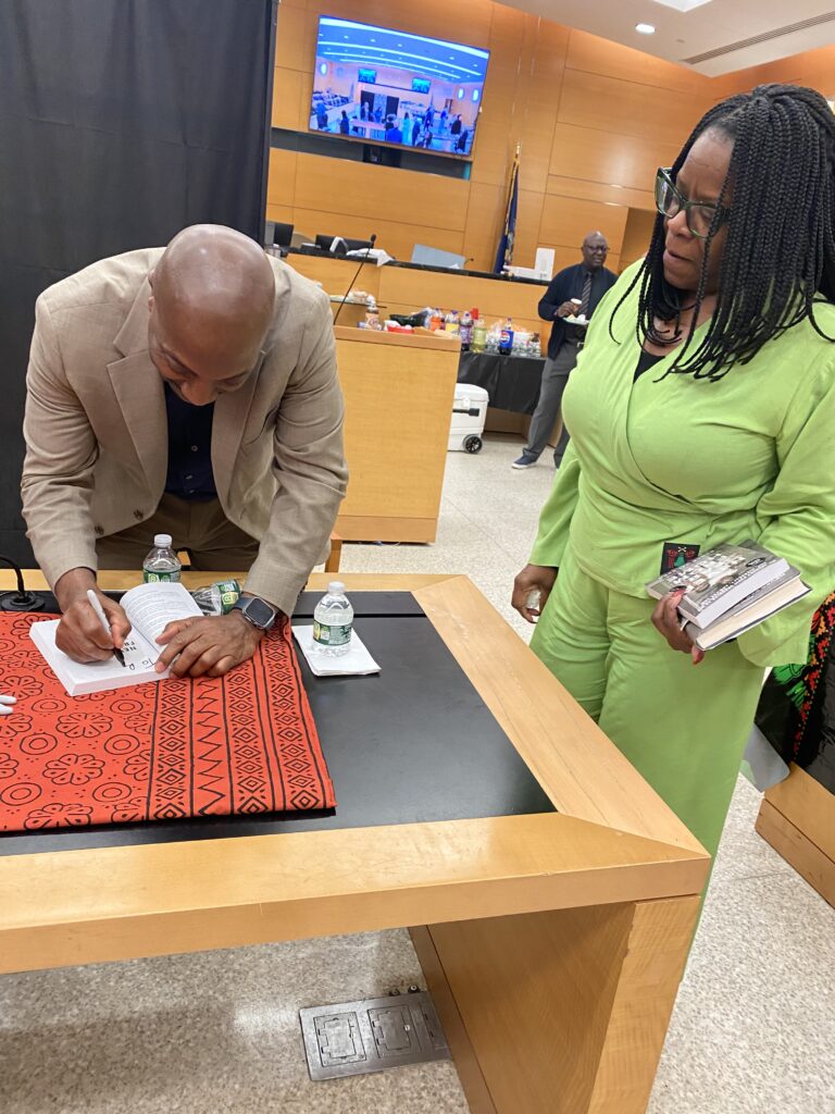 A personal touch from Bruce Jackson as he dedicates his book to Justice Robin Sheares.Photo courtesy of Hon. Genine Edwards