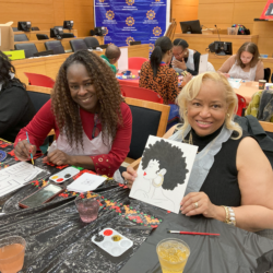 Leah Richardson (left) and Hon. Deborah Dowling, co-chairs of the Kings County Courts’ Black History Month Committee, taking part in the Tribune Society’s “Chat and Paint” event on Tuesday.Photos: Robert Abruzzese/Brooklyn Eagle