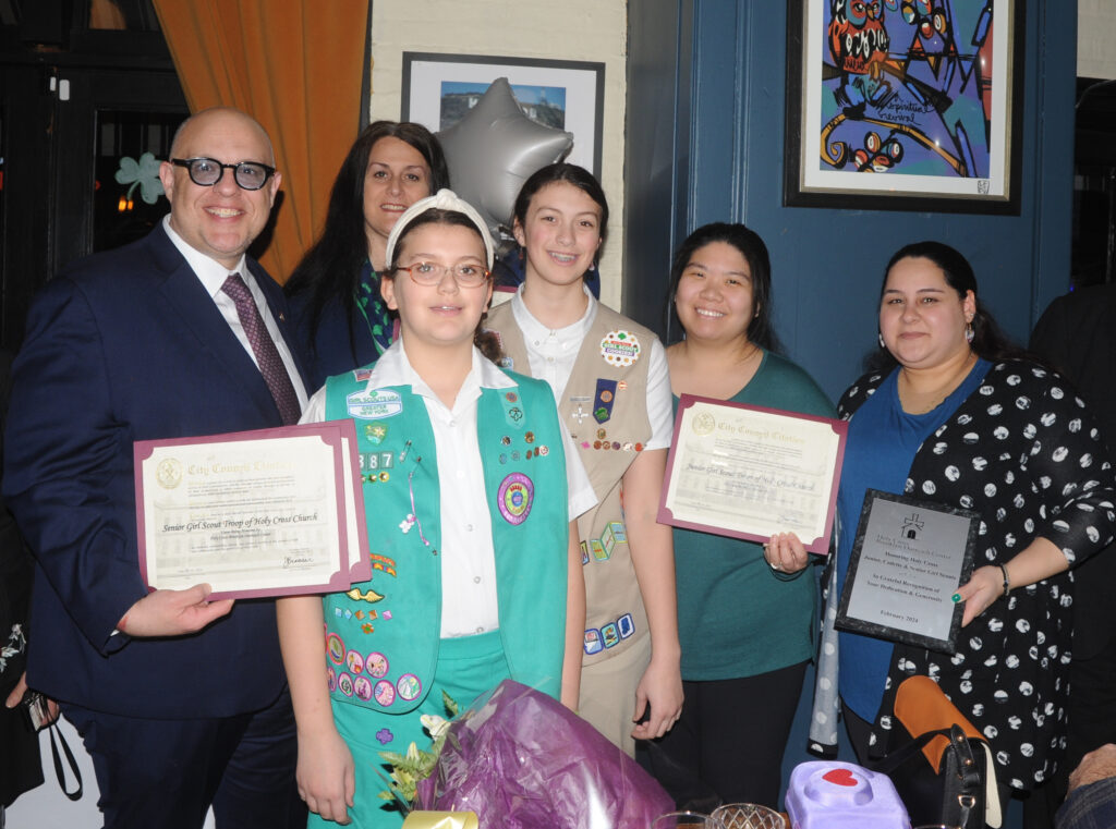 Councilmember Justin Brannan alongside the Girl Scouts of Holy Cross Church Brooklyn at HCBOC anniversary.