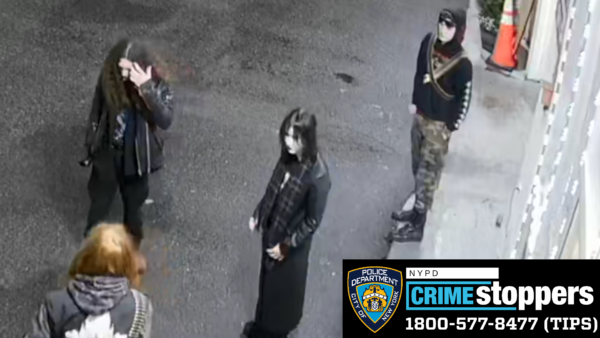 Suspected vandals who approached St. Columba Church around 2:45 a.m. on Jan. 23 are believed to have broken stained glass and damaged cross.<br>Photo courtesy NYPD/Crimestoppers
