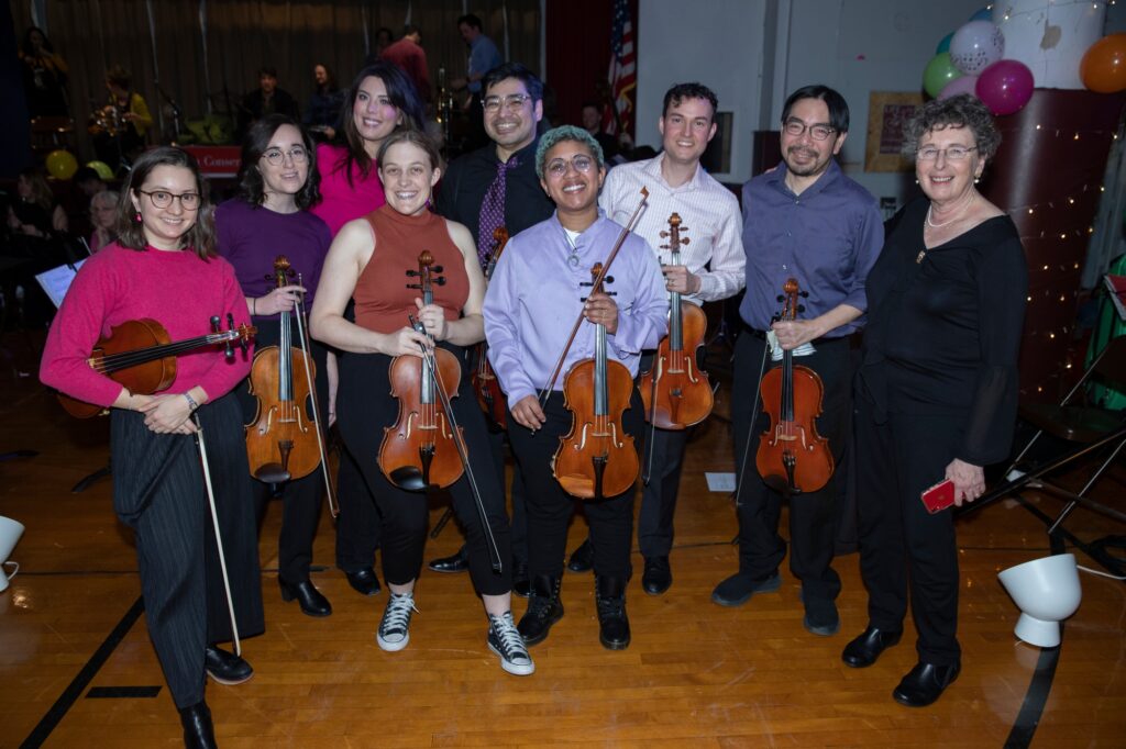 The BCC Orchestra Viola Section, Christine Legge, Brigid Bergin-Davidson, Tori Pacheco, Marygen White, Akira Fukui, LeiOra Hughes (not a typo), Shane Palmer, James Eng and Rose Moskowitz (Left to Right) at BCCO swing gala.