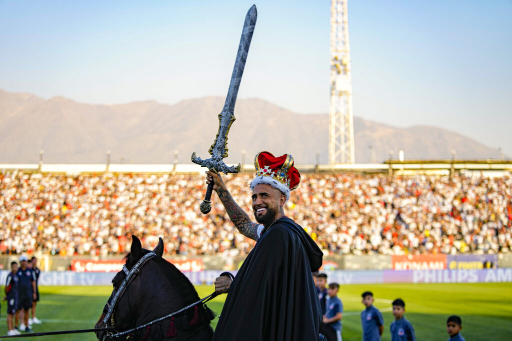 SANTIAGO — “Game of Thrones” imagery comes to the pitch: Chilean soccer player Arturo Vidal waves a sword while riding a horse onto the pitch at his welcoming event at the Monumental Stadium in Santiago, Chile, Thursday, Feb. 1, 2024. Vidal returns to play for Colo Colo after 17 years of a successful career playing for soccer clubs in Europe and South America.Photo: Esteban Felix/AP