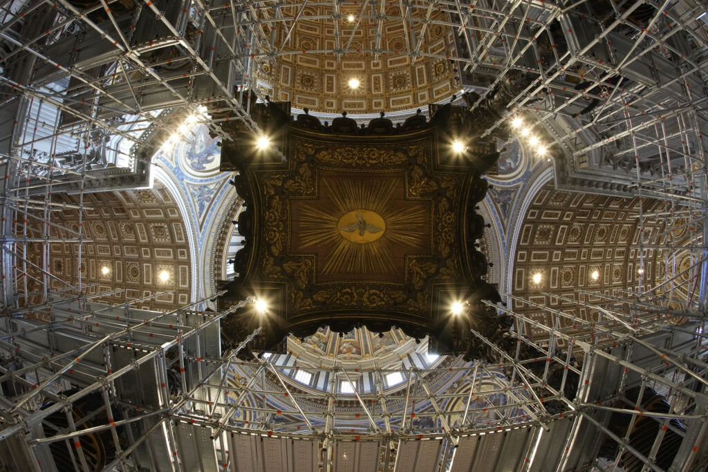 VATICAN — Big budget item in religious restoration: A view of scaffolding around the 17th century, 95ft-tall bronze canopy by Giovan Lorenzo Bernini surmounting the papal Altar of the Confession in St. Peter's Basilica at the Vatican, Wednesday, Feb. 21, 2024. Works have started for the year-long, 700,000 euro restoration of the monumental Baldacchino, or canopy, of St. Peter's Basilica, pledging to complete the first comprehensive work on Bernini's masterpiece in 250 years before Pope Francis' big 2025 Jubilee.Photo: Andrew Medichini/AP