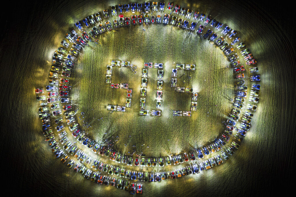 SWITZERLAND — Swiss supermarket owners refuse to share the wealth: Farmers organize themselves to form a giant "SOS" signal with their tractors as a coordinated stunt replicated in various locations across Switzerland, protesting against their work conditions and here specifically the price of milk, echoing numerous protests across Europe in recent weeks, in a field between the villages of Echallens and Goumoens-la-Ville, Switzerland, Thursday, Feb. 29, 2024.Photo: Valentin Flauraud/Keystone via AP