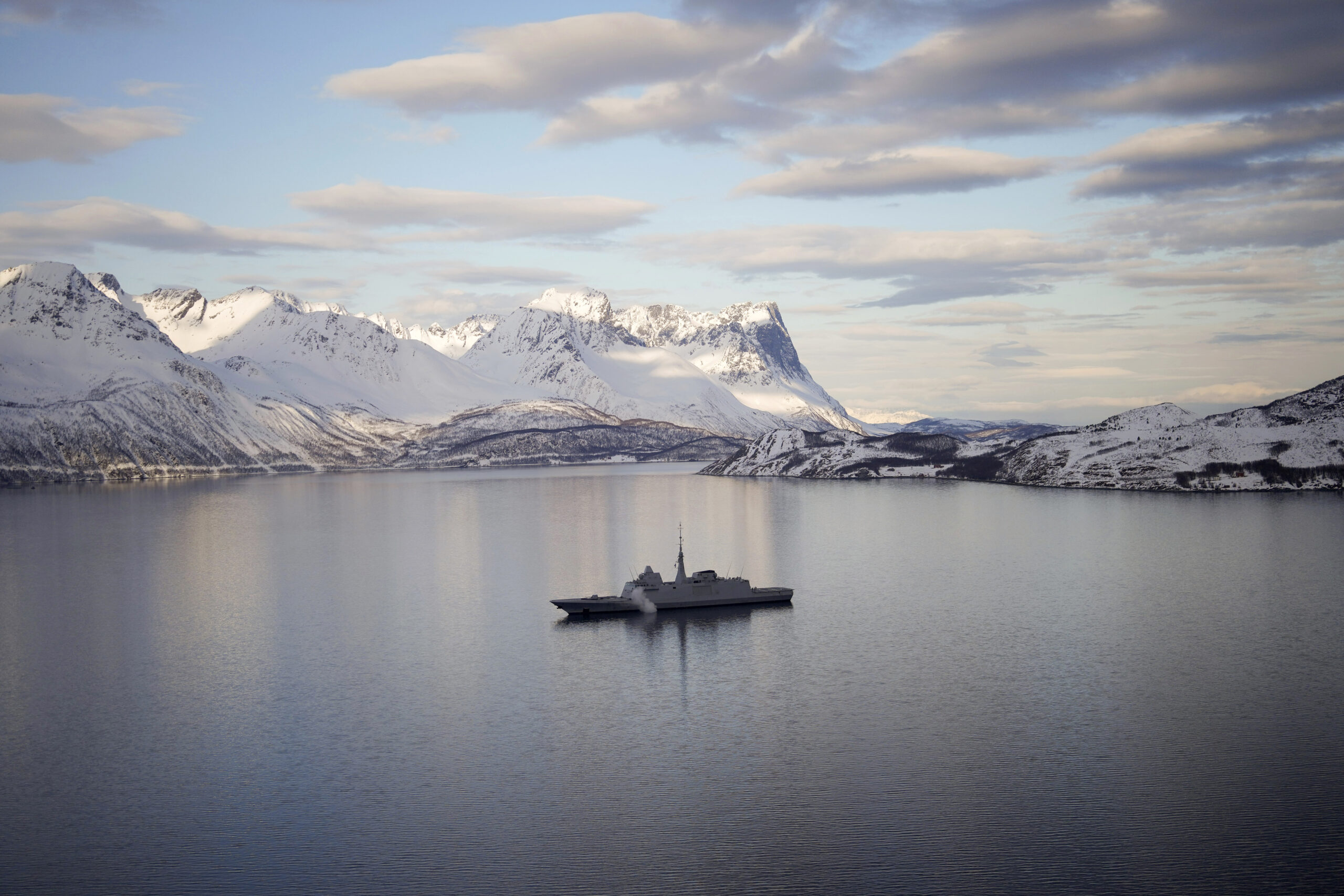 NORWEGIAN FJORD — “They also serve who only stand and wait…”: The French navy frigate Normandie patrols in a Norwegian fjord north of the Arctic circle, Wednesday, March 6, 2024. The French frigate is part of a NATO force conducting exercises, in the seas north of Norway, codenamed Steadfast Defender, which are the largest conducted by the 31-nation military alliance since the Cold War.Photo: Thibault Camus/AP