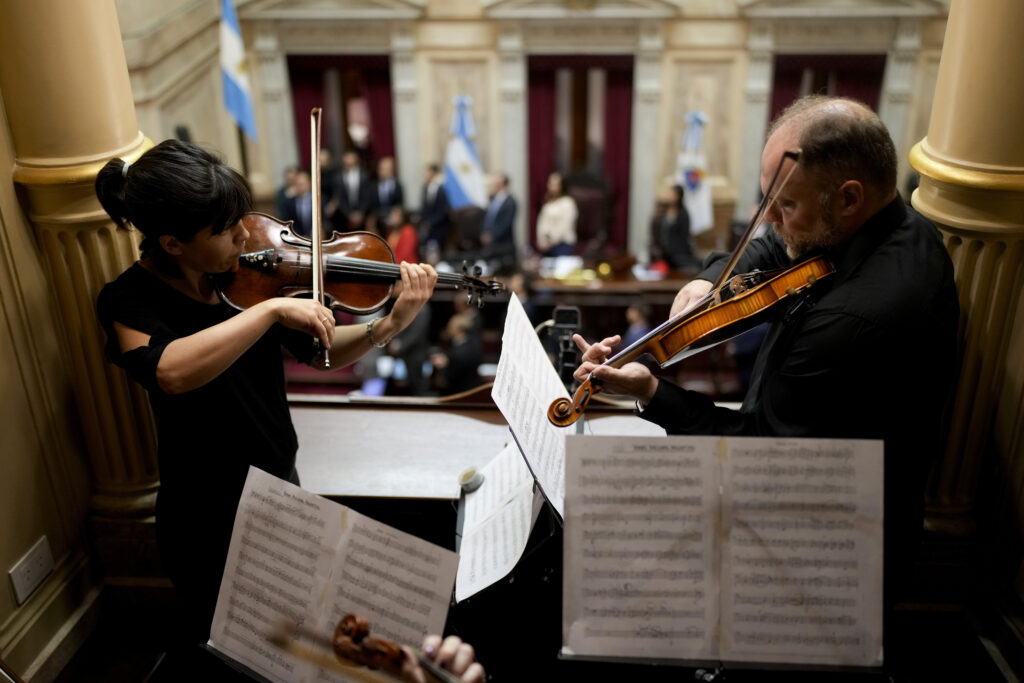 BUENOS AIRES — ‘Music has charms to soothe the savage breast…’ — Maybe it should be in more governing bodies: Musicians play the Argentine national anthem before the start of a Senate session at Congress in Buenos Aires, Argentina, Thursday, March 14, 2024.Photo: Natacha Pisarenko/AP