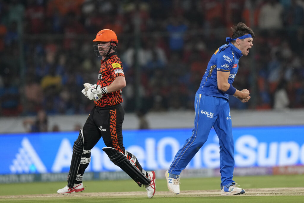 INDIA — ‘You’re OUT! ... I mean, dismissed …’: Mumbai Indians’ Gerald Coetzee, right, celebrates the dismissal of Sunrisers Hyderabad’s Travis Head, left, during the Indian Premier League cricket tournament between Sunrisers Hyderabad and Mumbai Indians in Hyderabad, India, Wednesday, March 27, 2024.10bPhoto: Mahesh Kumar A./AP