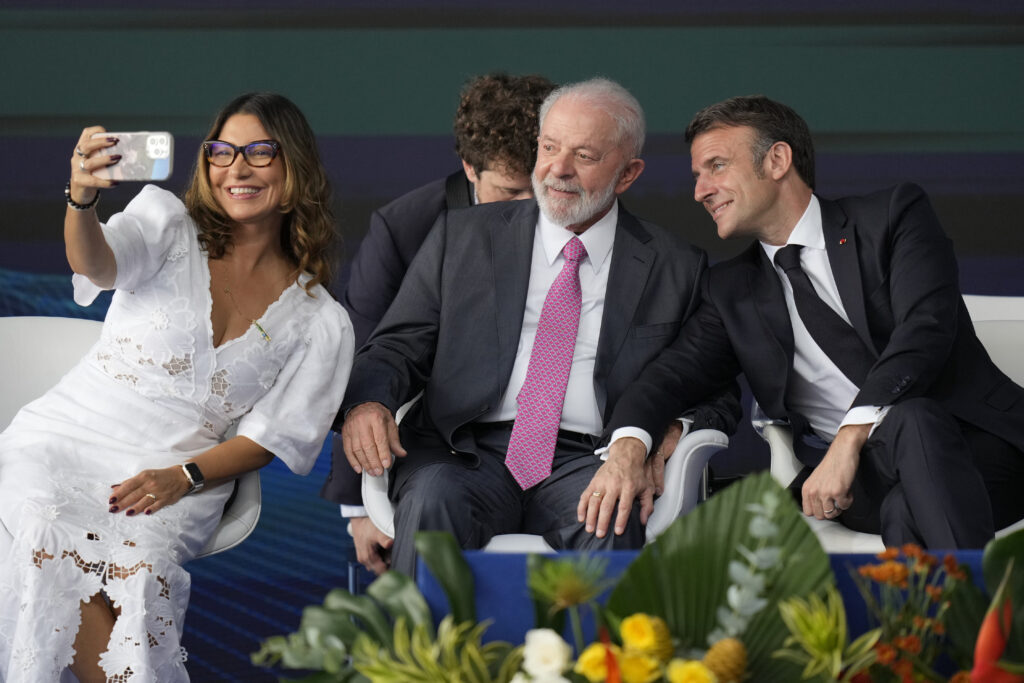 RIO DE JANEIRO — Macron ‘leans in’ for his daily selfie quota: Brazilian First Lady Rosangela da Silva takes a selfie with France’s President Emmanuel Macron, right, and her husband Brazilian President Luiz Inacio Lula da Silva during the launch ceremony of the Tonelero submarine, made in Brazil with French technology, in Itaguai, Rio de Janeiro state, Brazil, Wednesday, March 27, 2024. Macron is on a three-day visit to Brazil.Photo: Silvia Izquierdo/AP
